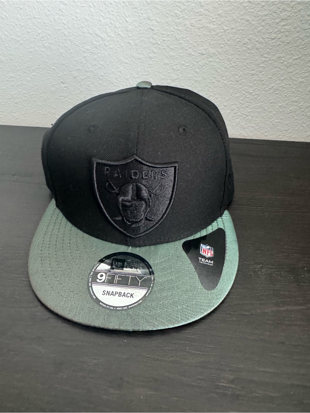 New Era Black & Olive Green Raiders Embroidered SnapBack